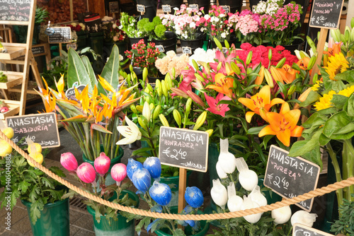 Colorful Flower Stall with Symbolic Labels in European Market