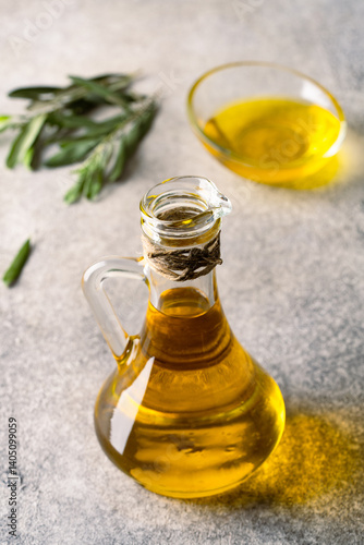 Obraz na płótnie Organic olive oil in a jug on vintage background w salonie