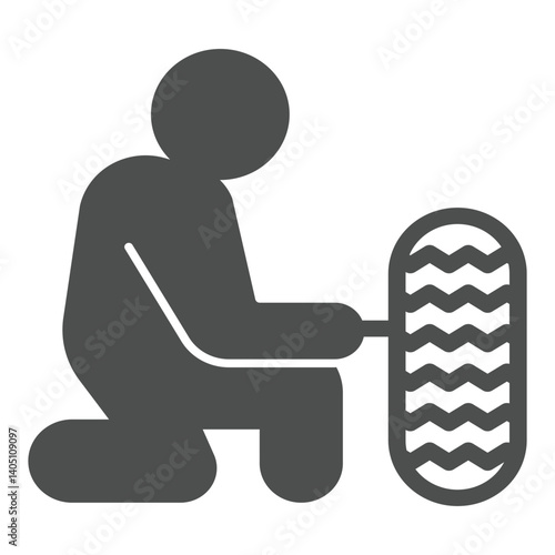 Mechanician with car wheel solid icon, tires fitting concept. Vector graphics. Man changing tire, car service sign on white background, glyph style icon for mobile or web design.
