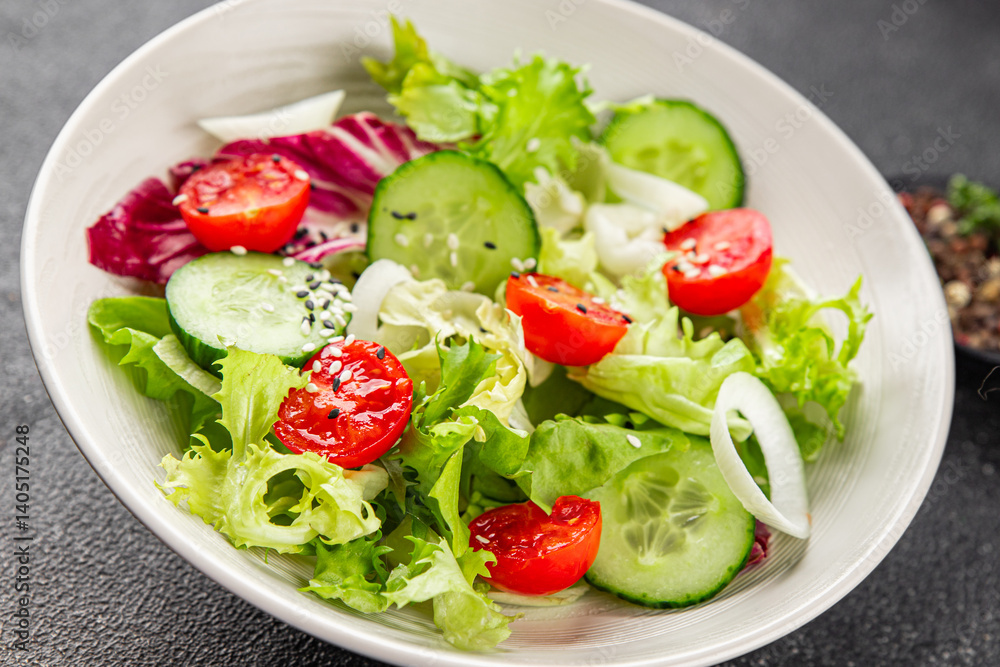 Salad vegetable tomato, cucumber, lettuce, green leaf lettuce, onion appetizer vegetable dish fresh gourmet food background rustic food top view copy space keto and paleo diet vegetarian vegan food Salad vegetable tomato, cucumber, lettuce, green leaf lettuce, onion appetizer vegetable dish fresh gourmet food background rustic food top view copy space keto and paleo diet vegetarian vegan food