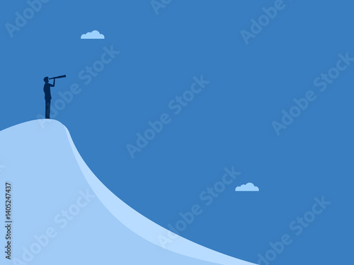 Businessman with vision on top of a high mountain