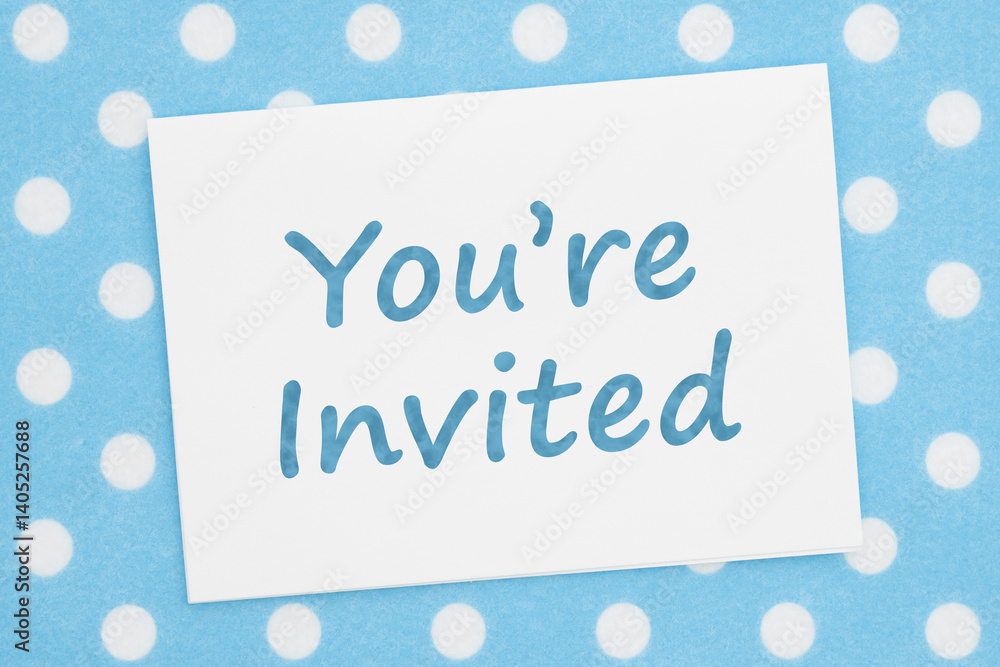 You are invited card on blue polka dots material