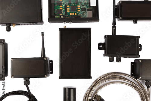 Modern electronic circuits on a white background, a set of various devices