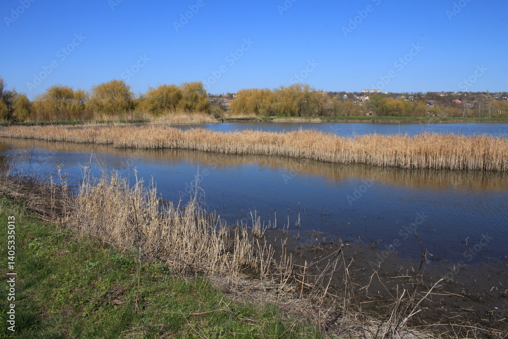 A body of water with a bridge over it A body of water with a bridge over it