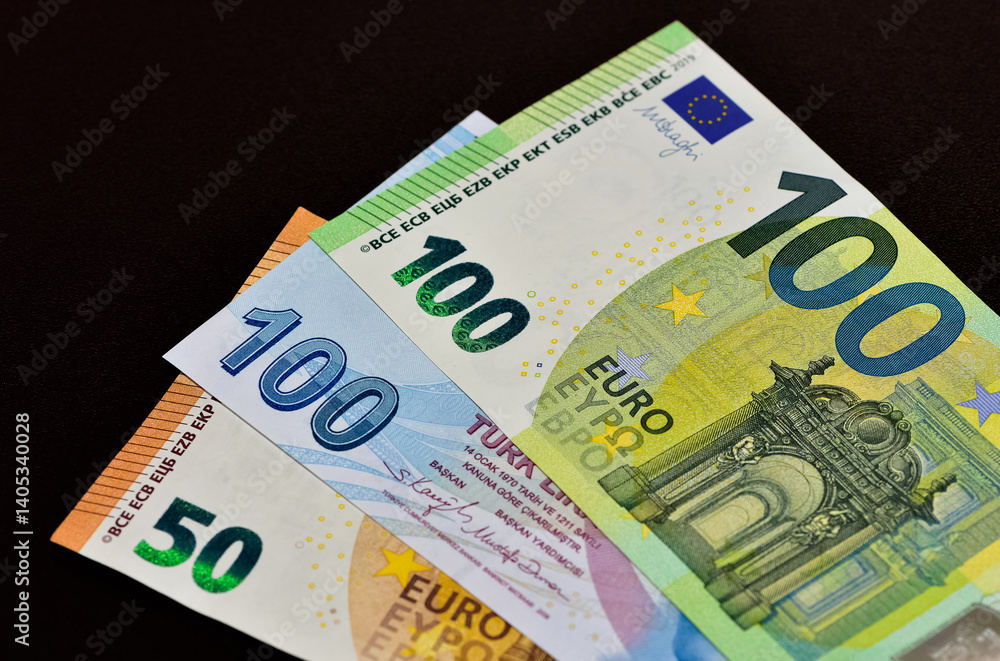 Obraz premium banknotes of various countries. photos of euros.