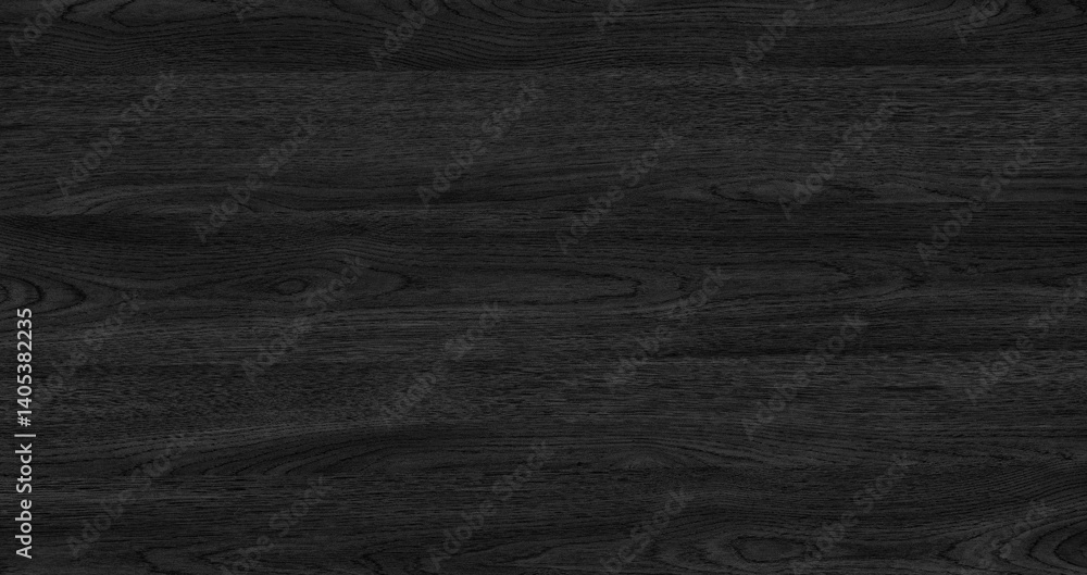 A black abstract wooden texture surface background with a grain pattern. The surface is dark and has a wood grain pattern. A black abstract wooden texture surface background with a grain pattern. The surface is dark and has a wood grain pattern.