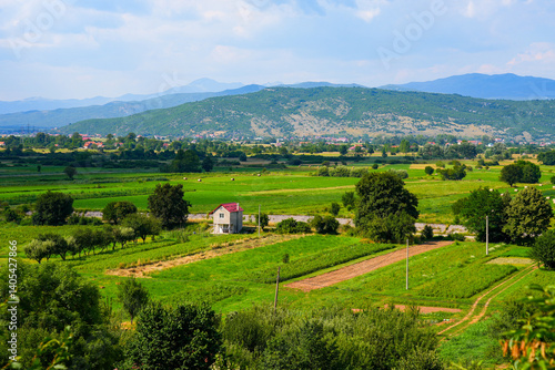 Obraz na płótnie Farm house along the Zeta river on the outskirts of Niksic in a rural valley of northern Montenegro w salonie