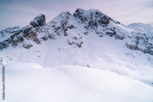 Snow capped high mountain peaks. winter in the dolomites alps. italy, europe. Passo Giau.