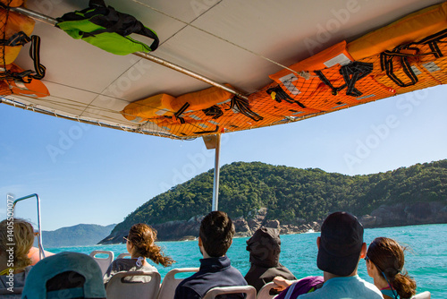 Passenger transportation with boat, taxi boat trip from Abraao, on the tropical Ilha Grande to Angra dos Reis, in the south of Rio de Janeiro Brazil