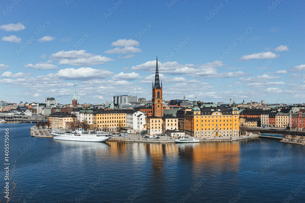 panorama of stockholm on beautiful sunny day with water reflections and clouds panorama of stockholm on beautiful sunny day with water reflections and clouds