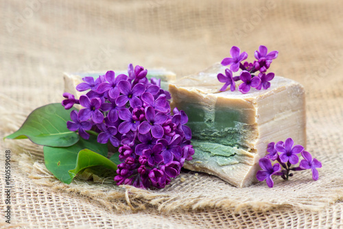 Obraz na płótnie bar of natural soap and lilac flowers - aromatherapy w salonie