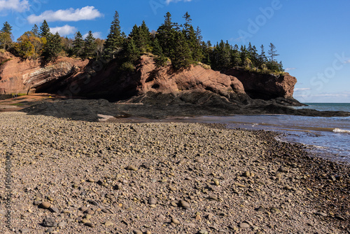 Slika na platnu Famous sandstone cliffs at St Martins sea caves at low tide, Bay of Fundy, New B