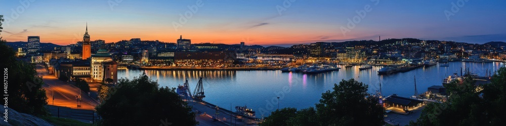 Obraz premium Stunning Oslo Nightscape: Captivating Panorama of City Hall and Harbour Lights in Norway's Vibrant Skyline