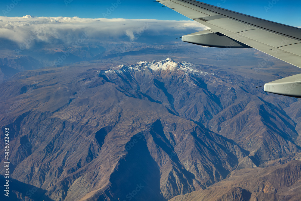 Moments before landing in Arequipa, the window reveals a surreal world—volcanic peaks, craters, and vast highlands shaped by ancient fire. Moments before landing in Arequipa, the window reveals a surreal world—volcanic peaks, craters, and vast highlands shaped by ancient fire.