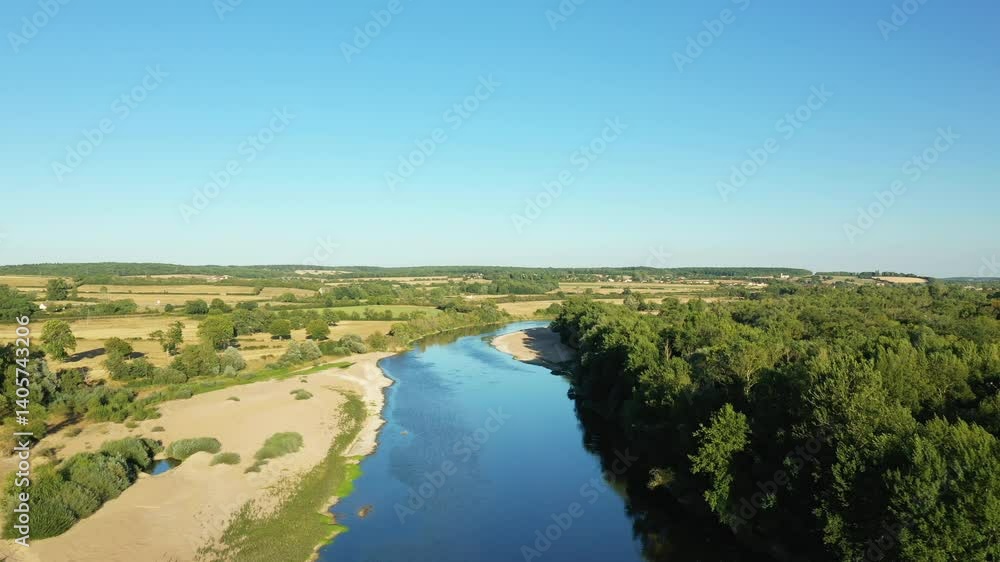 The sandbanks of the Loire between fields and forests in Europe, in France, in Burgundy, in Nievre, in summer, during a stormy day. The sandbanks of the Loire between fields and forests in Europe, in France, in Burgundy, in Nievre, in summer, during a stormy day.