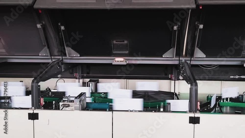 Automated Letter Sorting Machine at Post Office and Distribution Center. Close Up. 4K Resolution