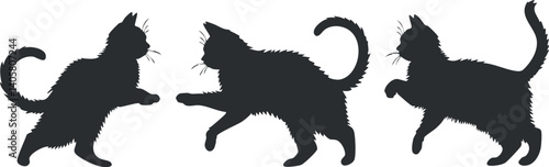 Silhouettes of cats in various playful poses showcasing their graceful movements and curiosity.