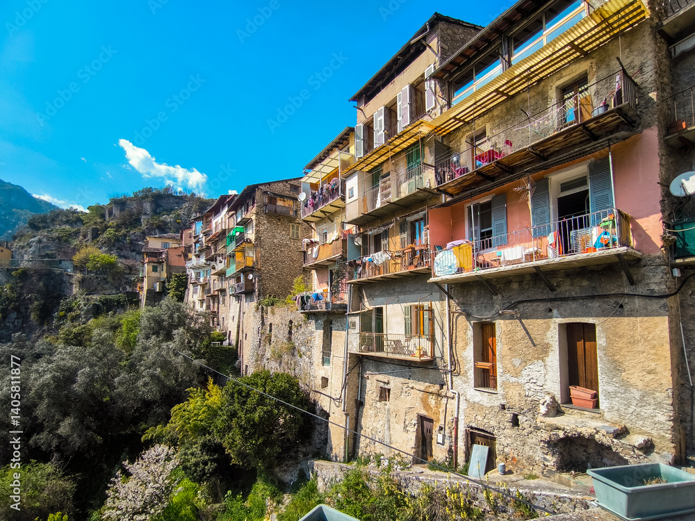 Obraz premium Picturesque Streets and Colorful Houses of Saorge Village: A Charming Snapshot of the Southern French Countryside