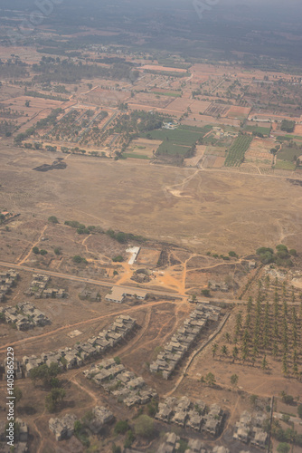 Obraz na płótnie India, Karnataka, Bangalore, Aerial view of city outskirts in the day from an aeroplane window w salonie