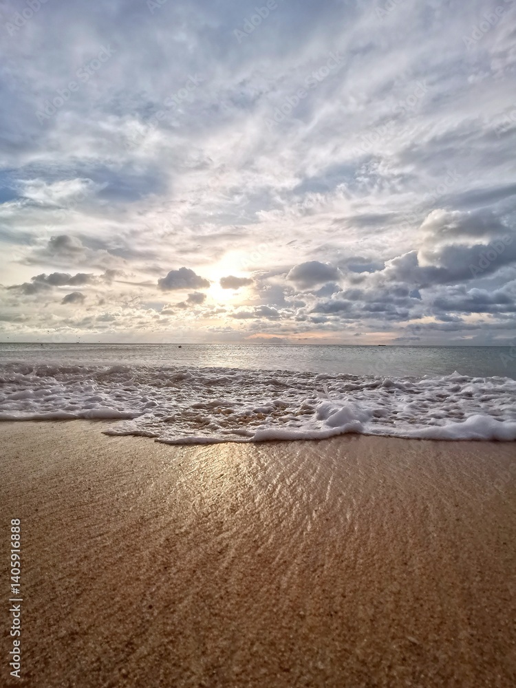 Serene Beach Scene with Waves and Clouds Serene Beach Scene with Waves and Clouds