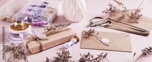 An envelope sealed with wax and a craft kit on the table web banner