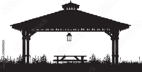 Silhouette of a gazebo surrounded by grass featuring a table and bench for outdoor leisure.