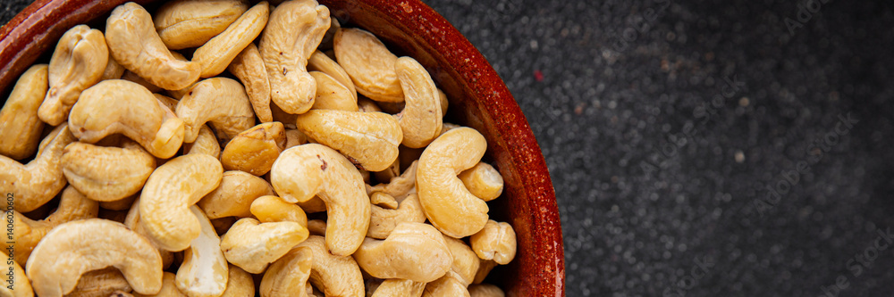 Cashew nuts natural superfood natural food dish organic product fresh tasty gourmet food background on the table rustic food top view copy space keto and paleo diet vegetarian vegan food Cashew nuts natural superfood natural food dish organic product fresh tasty gourmet food background on the table rustic food top view copy space keto and paleo diet vegetarian vegan food