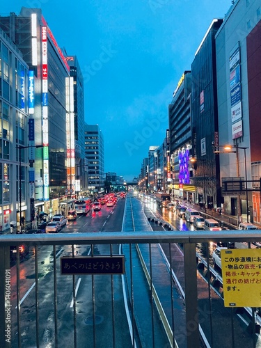 Rainy Japanese City Street at Night with Neon Lights