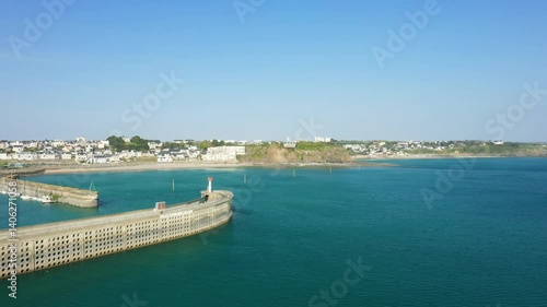 Wallpaper Mural The end of the Granville sea wall on the sea in Europe, France, Normandy, the English Channel, in spring, on a sunny day.  Torontodigital.ca