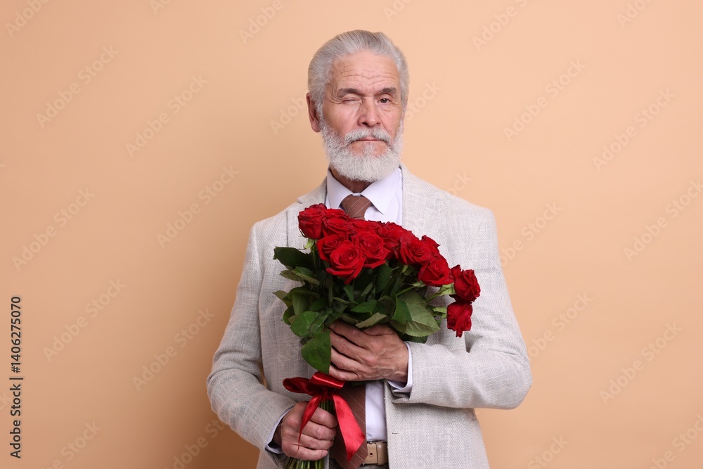 Senior man with bouquet of red roses on beige background Senior man with bouquet of red roses on beige background
