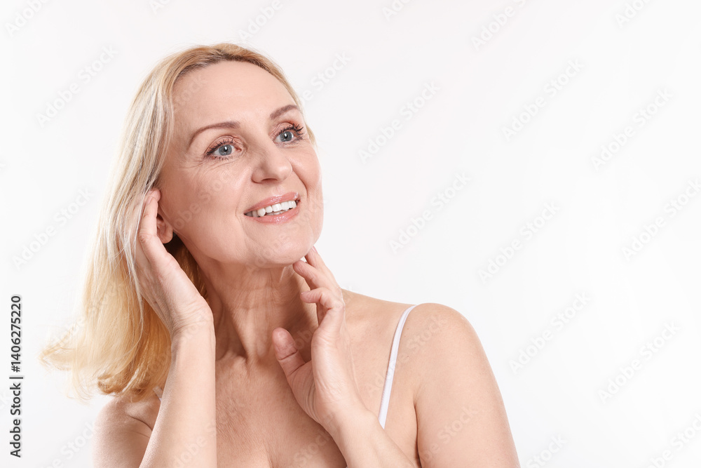 Smiling middle aged woman on white background. Space for text Smiling middle aged woman on white background. Space for text