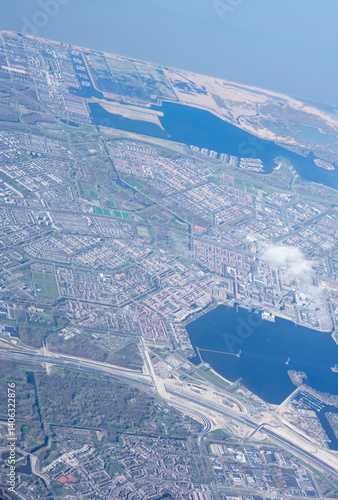 Obraz na płótnie Netherlands, Holland, Dutch, Aerial view of city outskirts in the day from an aeroplane window w salonie