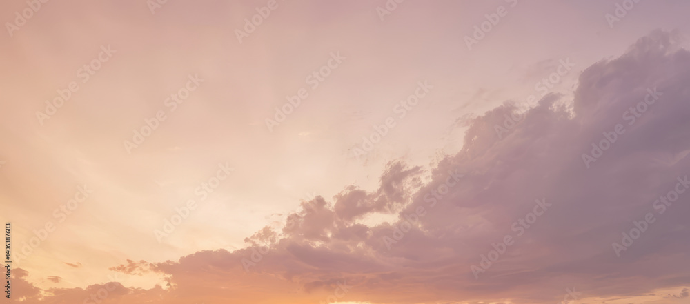 Soft pink and orange sky with clouds at sunset or sunrise. Soft pink and orange sky with clouds at sunset or sunrise.