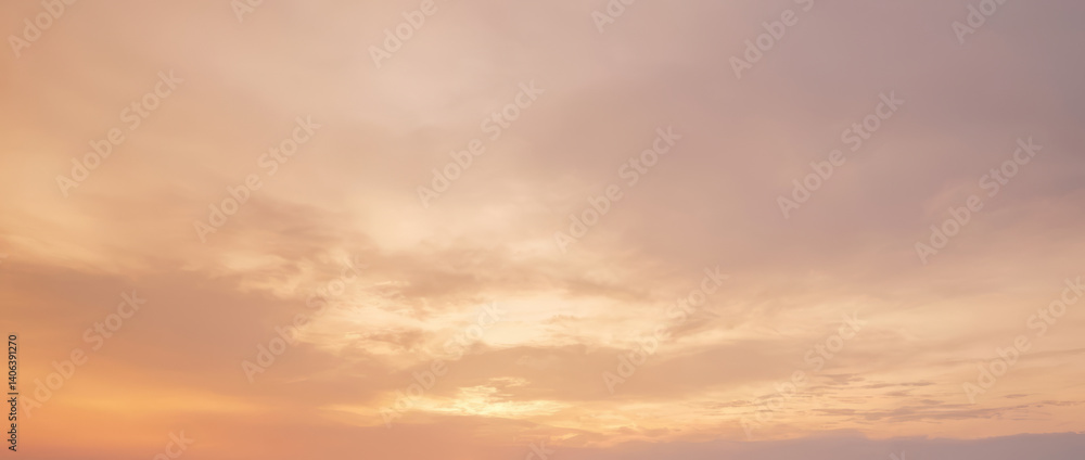 Sky with clouds at sunset featuring orange and purple hues. Sky with clouds at sunset featuring orange and purple hues.