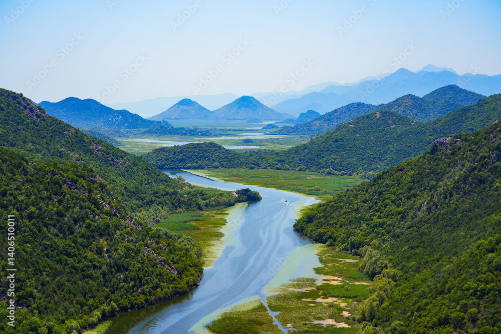 Aerial view of the river Rijeka Crnojevića (River of Crnojević) flowing in the mountains near the Lake Skadar in Montenegro