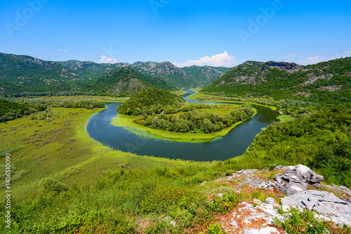 Obraz na płótnie River Rijeka Crnojevića (River of Crnojević) flowing in the mountains near the Lake Skadar in Montenegro, as seen from the opposite bank of the Pavlova Strana viewpoint w salonie