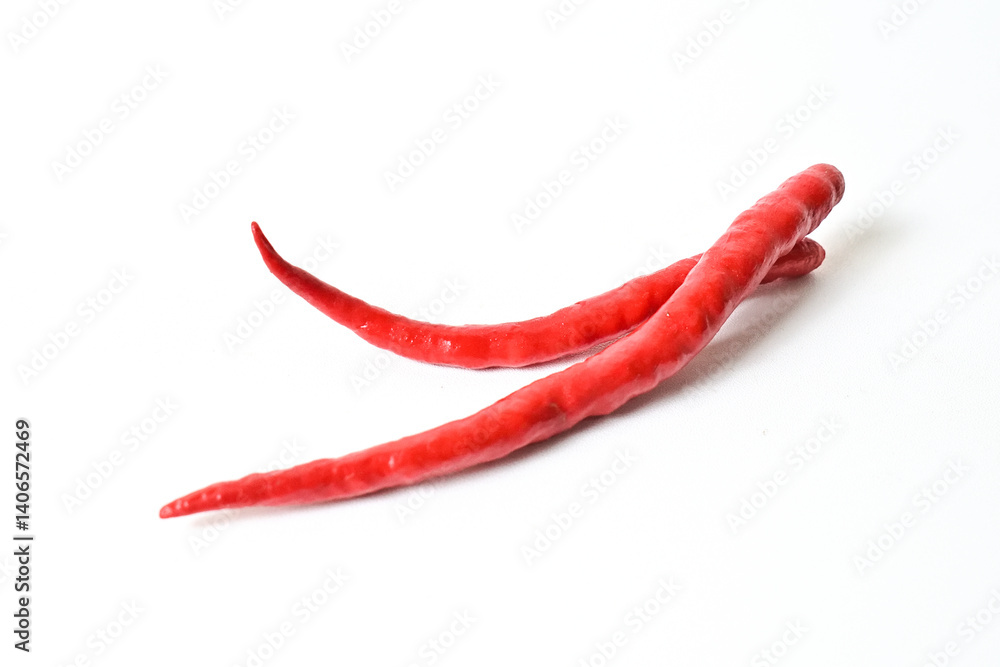 Close up view of two (2) fresh red chili peppers isolated on white background. Clipping path. Close up view of two (2) fresh red chili peppers isolated on white background. Clipping path.