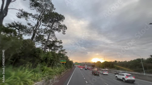 Morning traffic on State Highway 16 Auckland New Zealand.in 2018 70 percent of all trips made in Auckland were made by a private or company car.