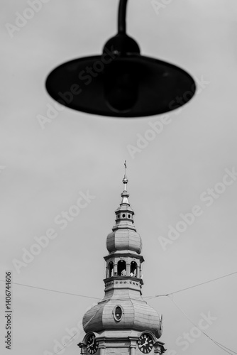 Obraz na płótnie Church tower. Blurred lantern in the foreground. Katowice, Nikiszowiec. Poland w salonie
