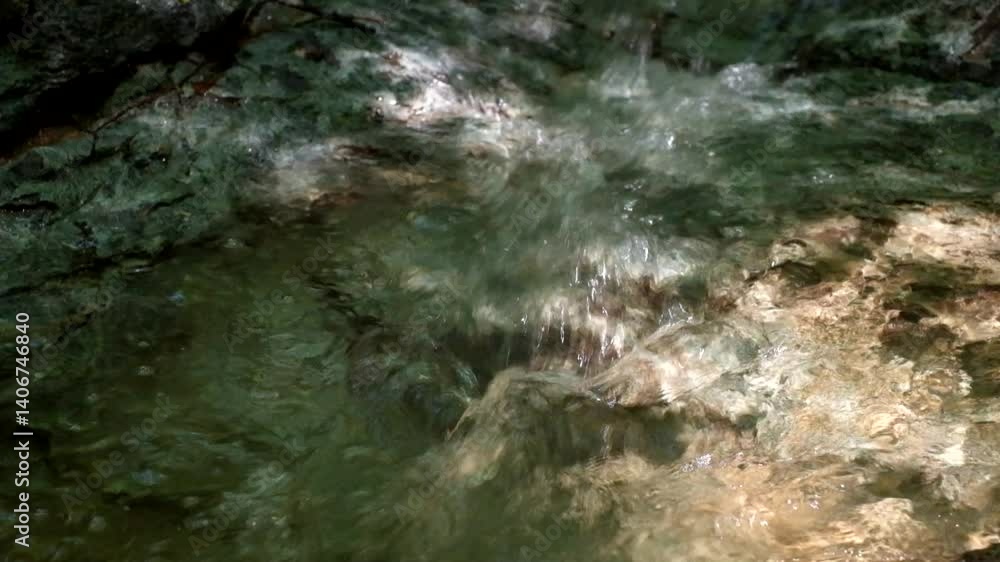 fast-flowing mountain stream, close view fast-flowing mountain stream, close view
