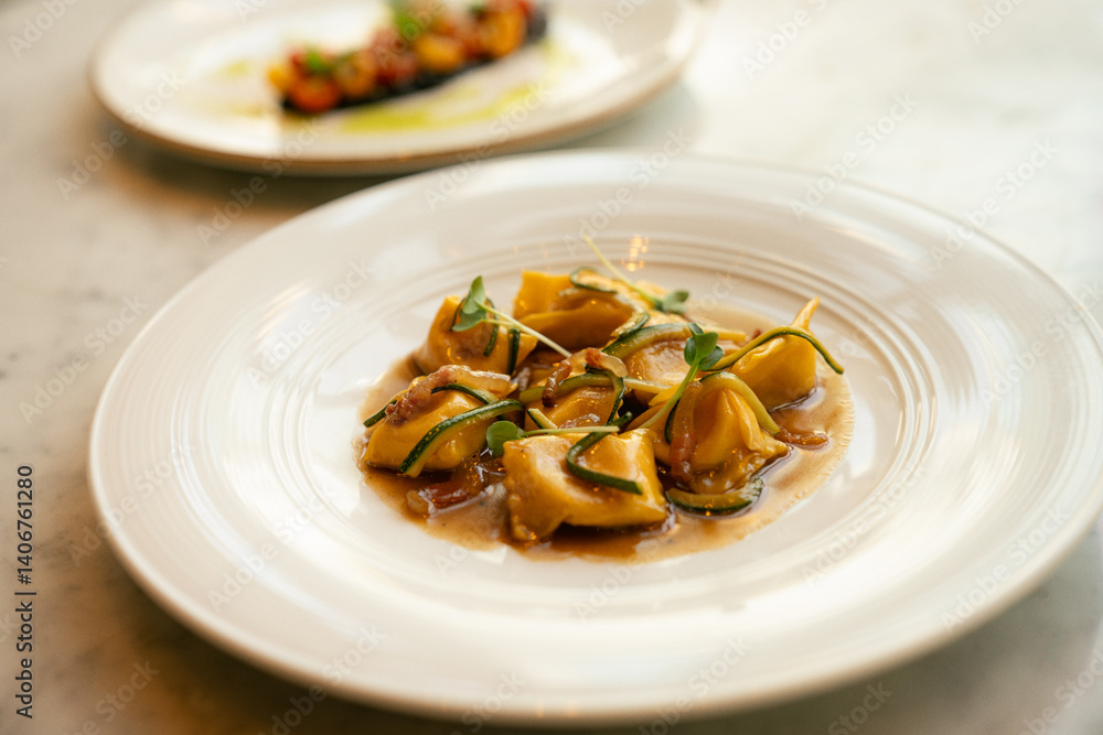 Plated Stuffed Pasta in Savory Brown Sauce – Fine Dining Concept Plated Stuffed Pasta in Savory Brown Sauce – Fine Dining Concept