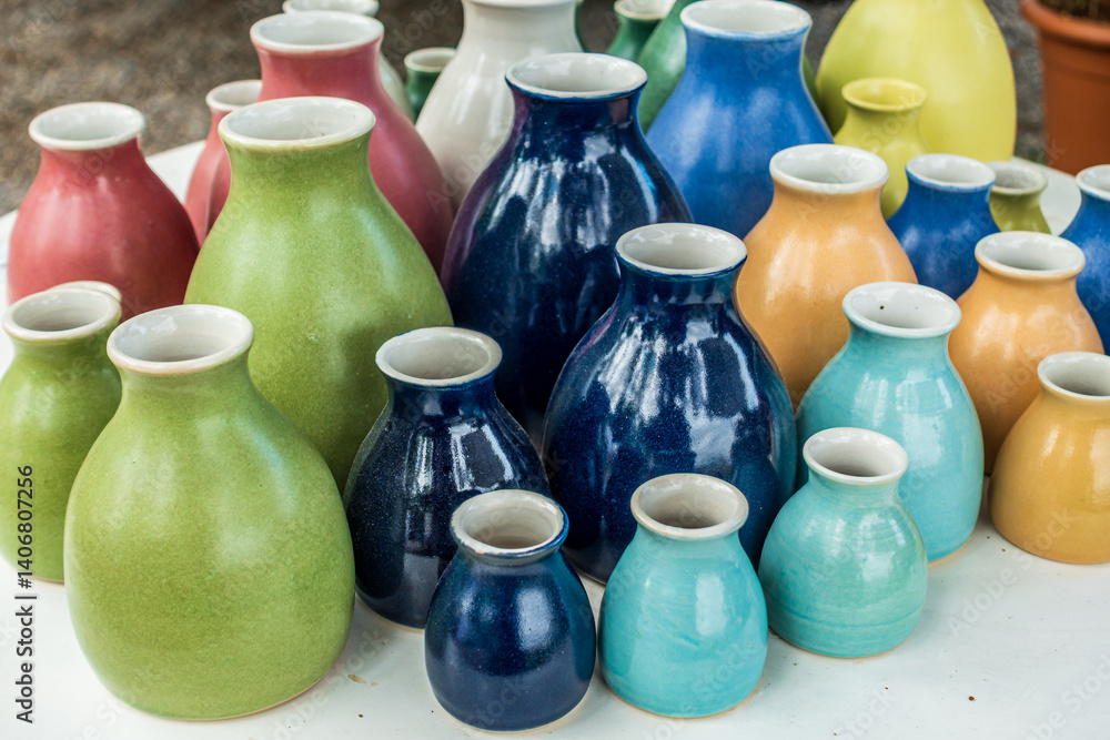 custom made wallpaper toronto digitalCollection of handmade ceramic vases in various colors and sizes displayed on a table at an artisan market
