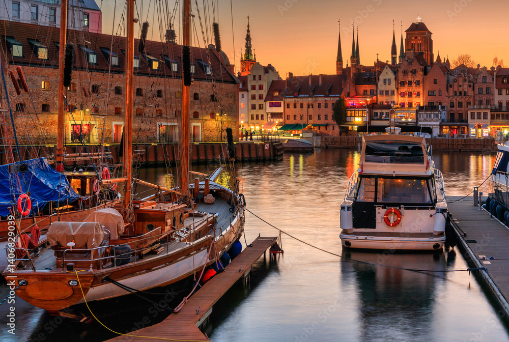 Beautiful old town of Gdansk with historic architecture at Motlawa river at sunset, Poland