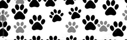 A_repeating_pattern_of_alternating_black_and_gray_paw_prints_is_displayed_on_a_white_background,_creating_a_playful_and_animal-themed_design