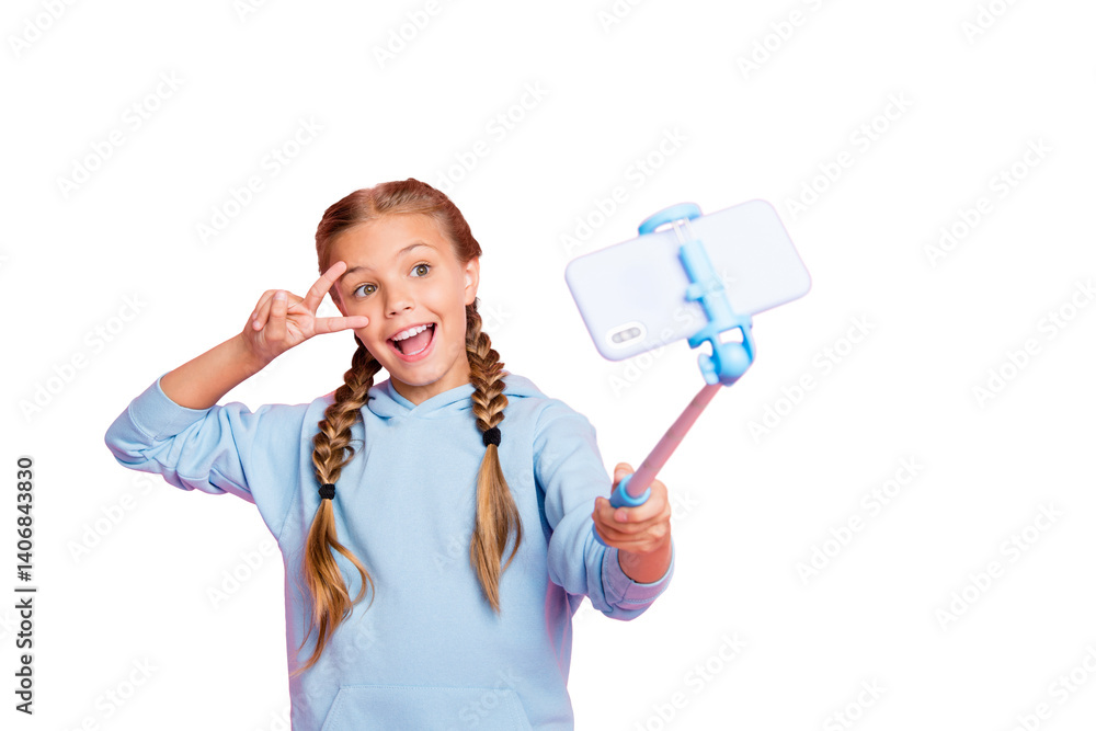 Photo of casual cheerful excited cute blonde girl wearing blue sweater taking selfie using self stick at leisure isolated over pink pastel color background Photo of casual cheerful excited cute blonde girl wearing blue sweater taking selfie using self stick at leisure isolated over pink pastel color background