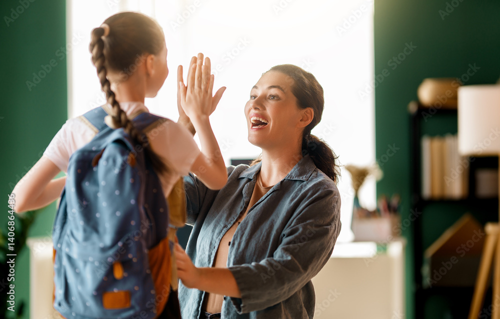 Fototapeta premium Happy family preparing for school