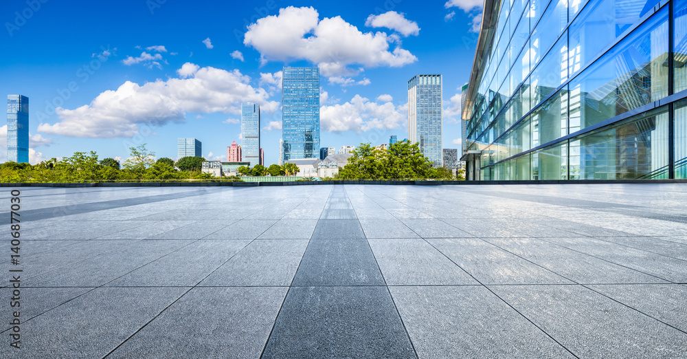 Empty square floor and glass wall with modern office buildings background