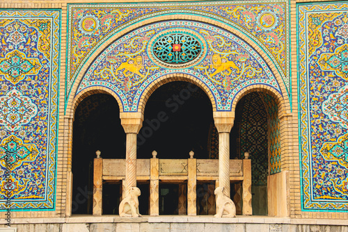 Persian royal architecture, Golestan Palace facade, Traditional Persian arches and columns, Historic facade of Golestan Palace, Royal architecture with open arches, Stone columns and Persian tilework