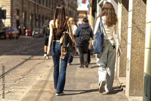 Two young women, friends in Milan.