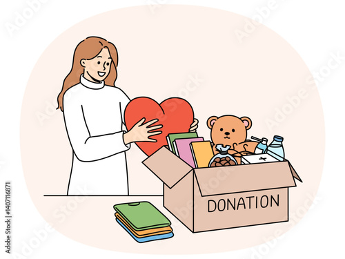 Kind woman stands near donation box with big heart in hands, wanting to help people in need. Collecting donation box of toys and books for children who find themselves in difficult financial situation